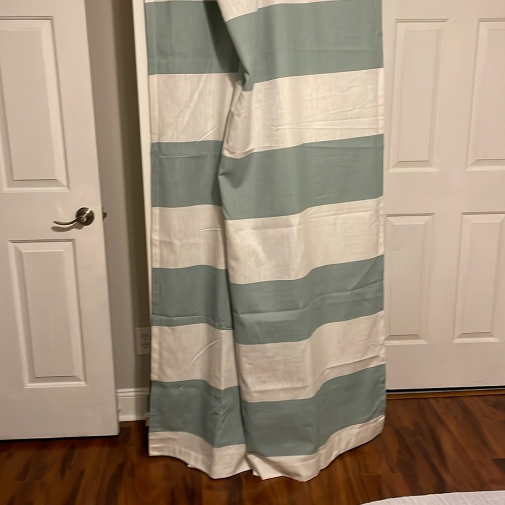 Turquoise and white striped curtains